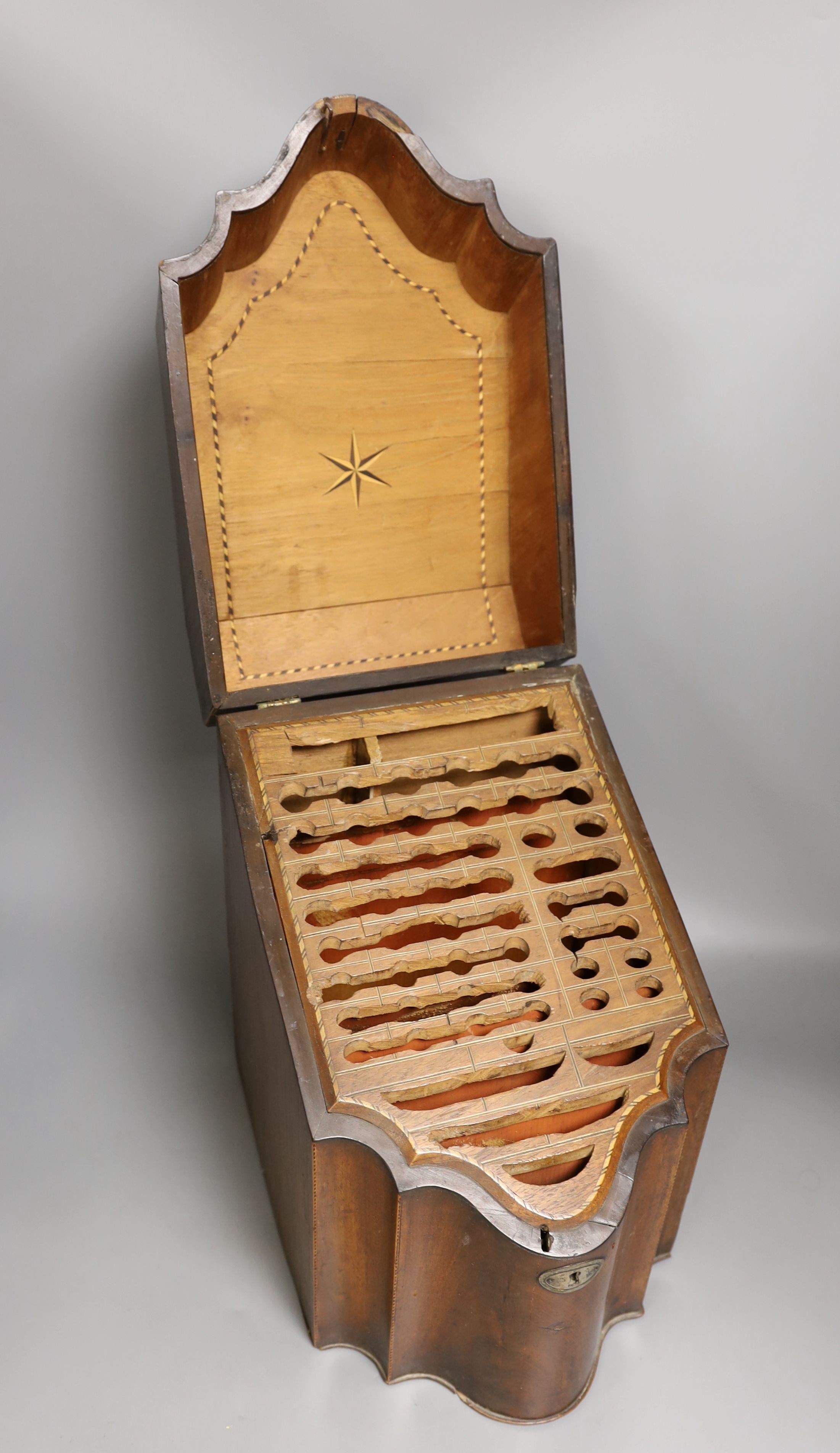 A George III mahogany and line inlaid knife box, 37 cms high.